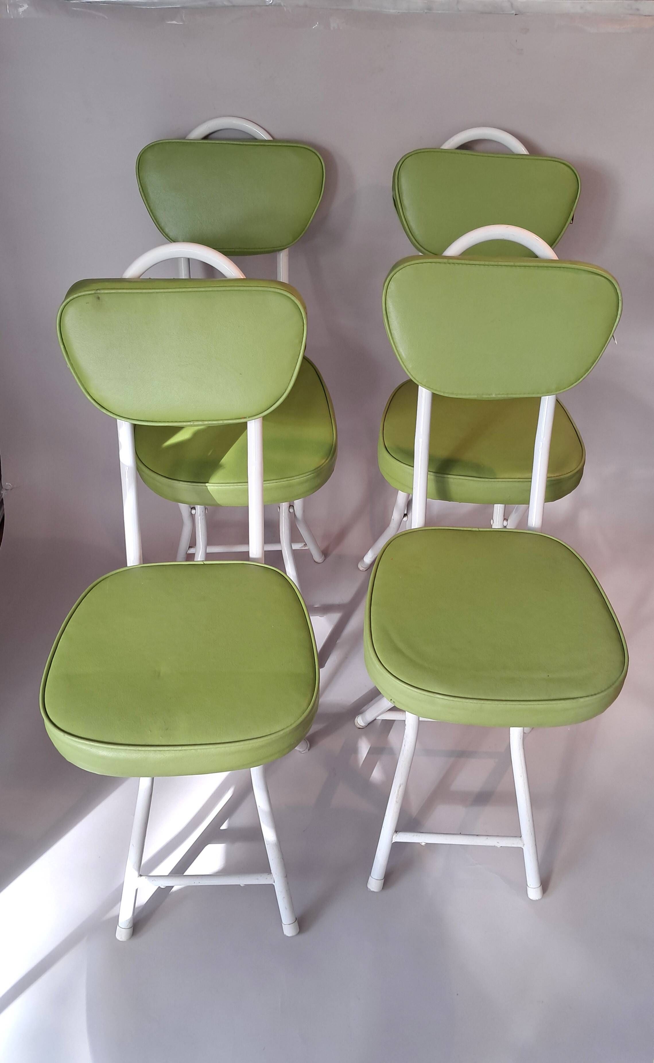 Set of 4 folding cocktail chairs in olive green faux leather from the 1970s.