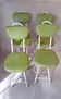 Set of 4 folding cocktail chairs in olive green faux leather from the 1970s.