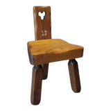 Tripod chair for children, Scandinavian brutalist chalet design.