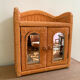 Small vintage rattan wall cabinet