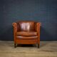 Chaise club en cuir de mouton