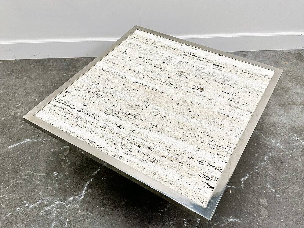 Brute travertine coffee table with brass base and chrome edges, France 1970s.