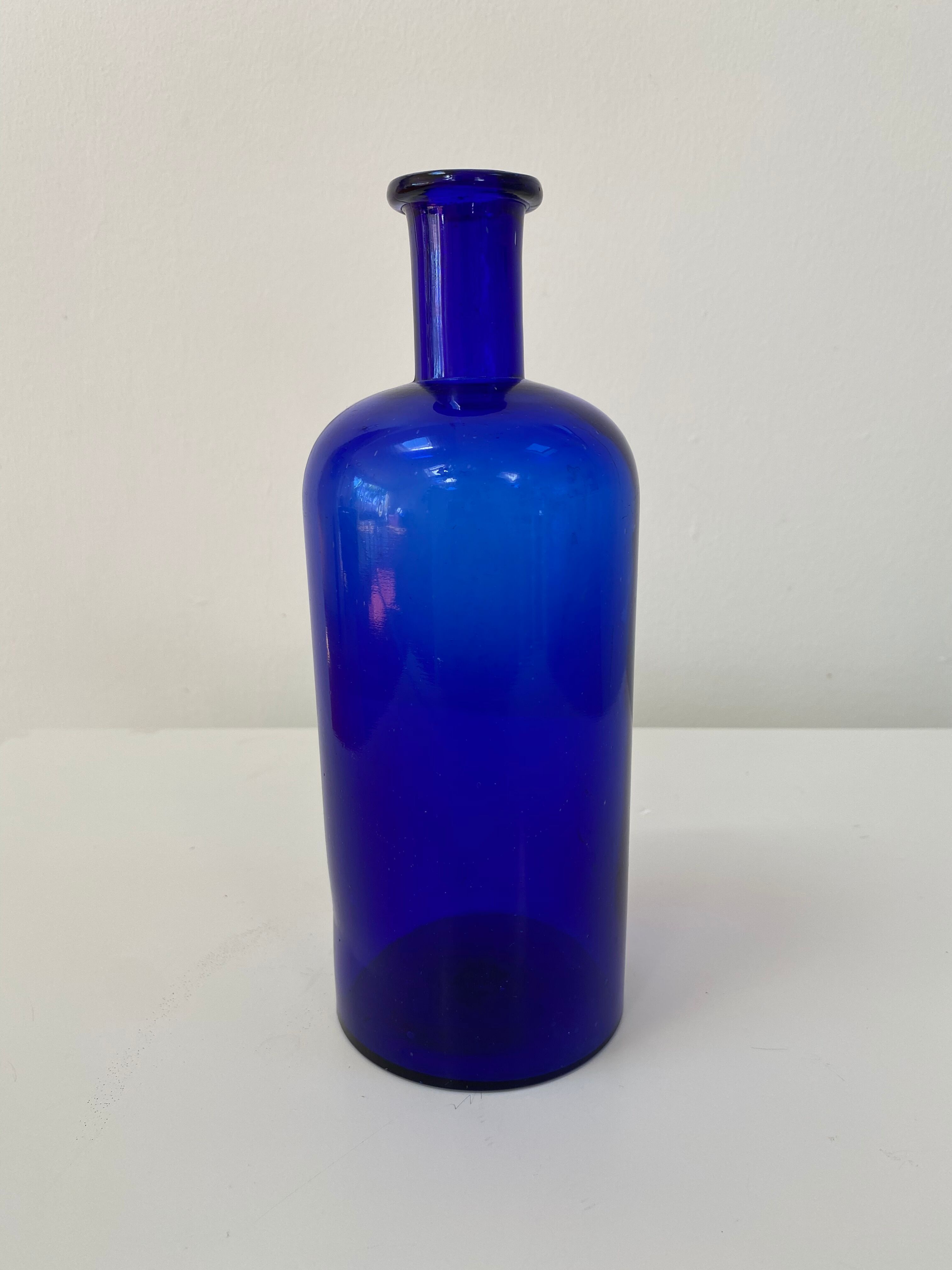 Cobalt blue glass pharmacy bottle