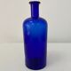 Cobalt blue glass pharmacy bottle