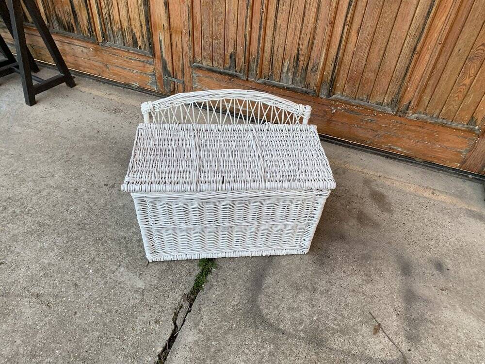 Vintage white wicker chest with double lid and decorative weaving.