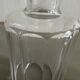 Glass bottle and its glass stopper