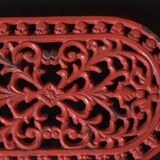 Red cast iron trivet