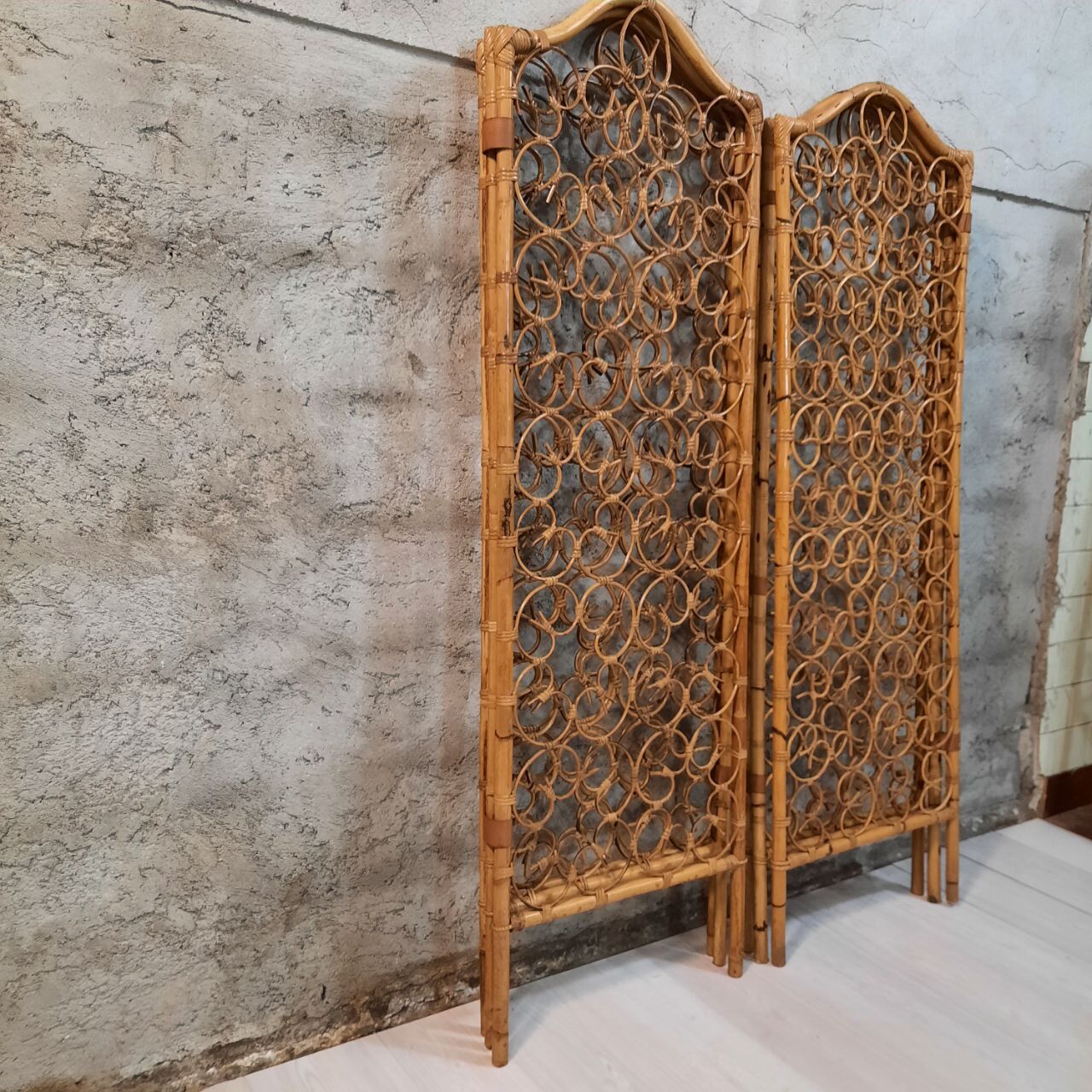 Vintage screen made of bamboo, wicker and leather