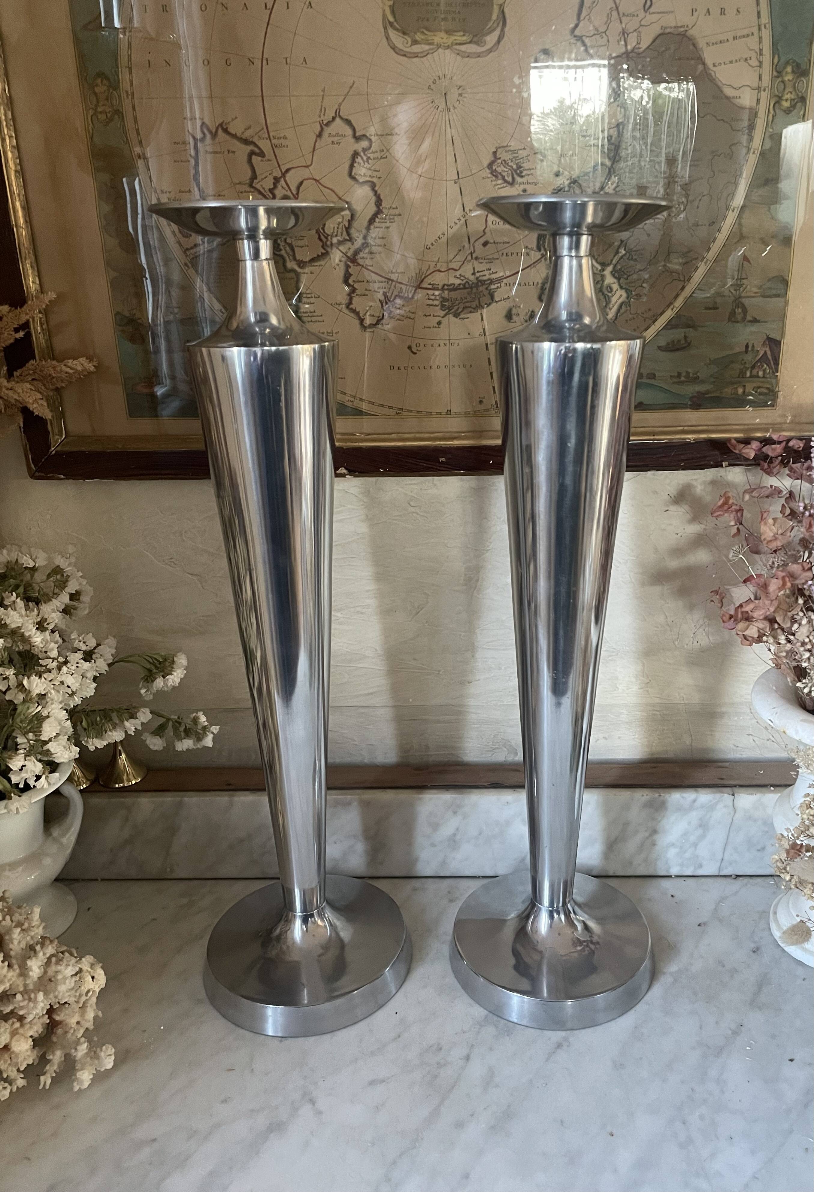 Pair of aluminium cast candle holders 52cm