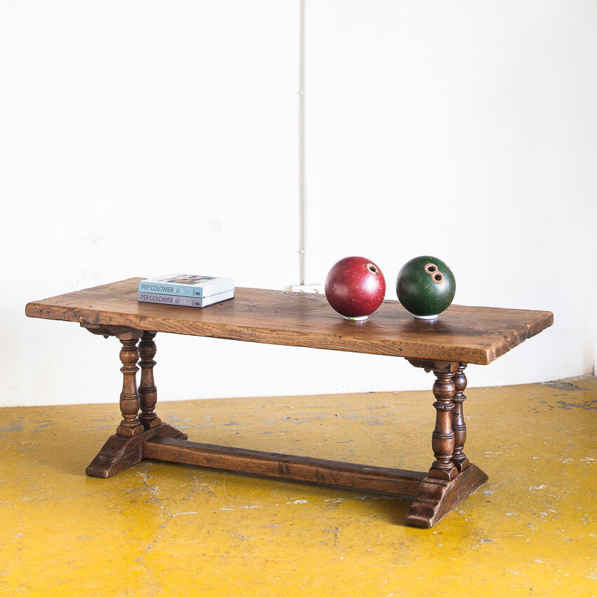 Old coffee table in solid oak wood. France, early twentieth century.