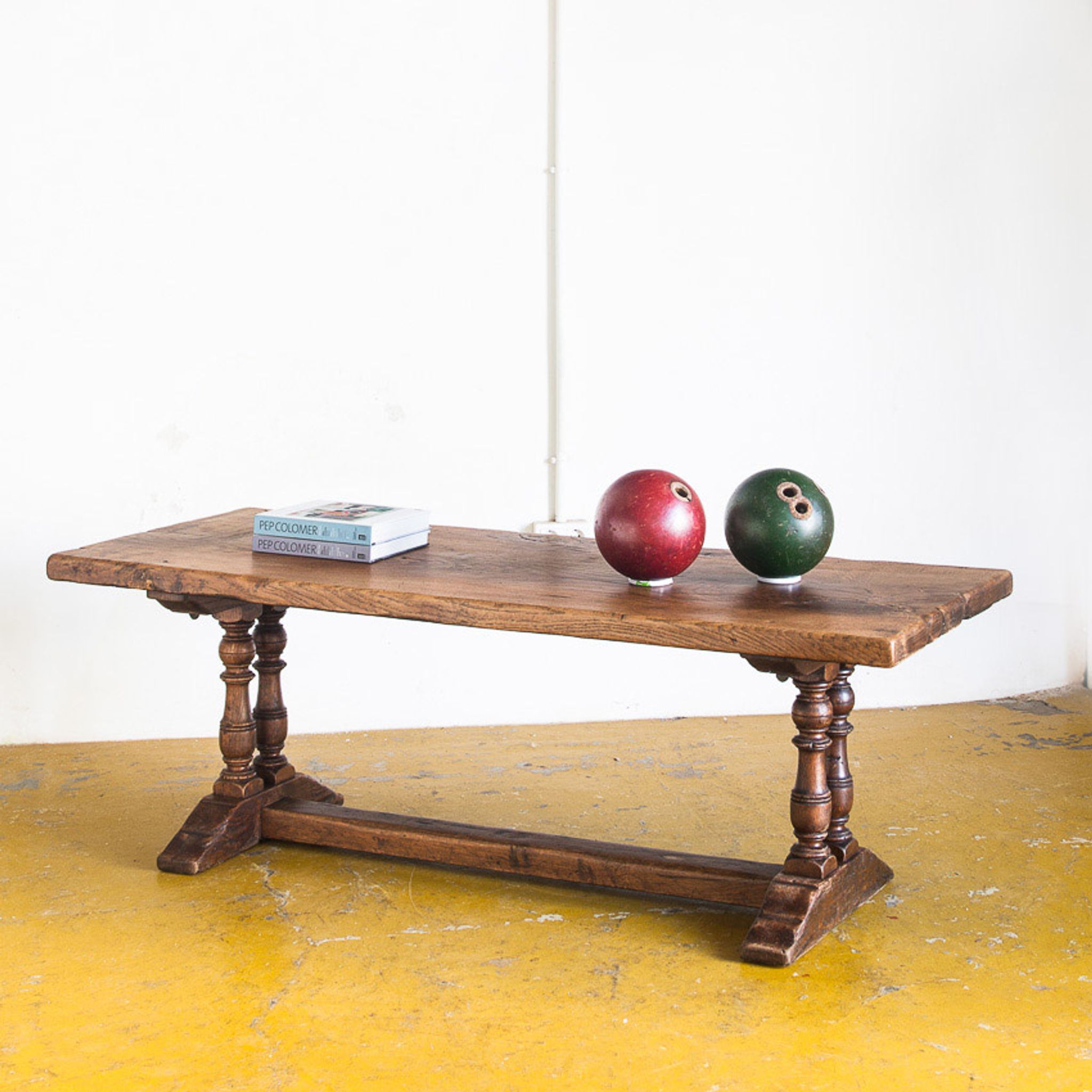 Old coffee table in solid oak wood. France, early twentieth century.