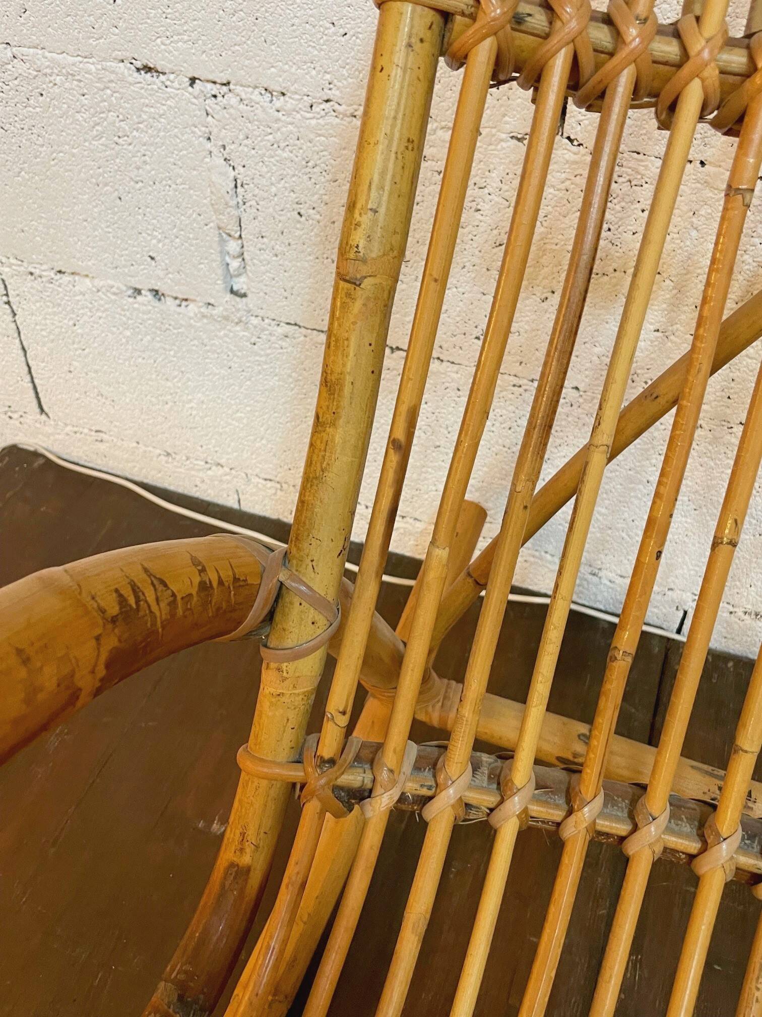 Vintage rocking chair in rattan by Rohé (Holland) from the 1960s.