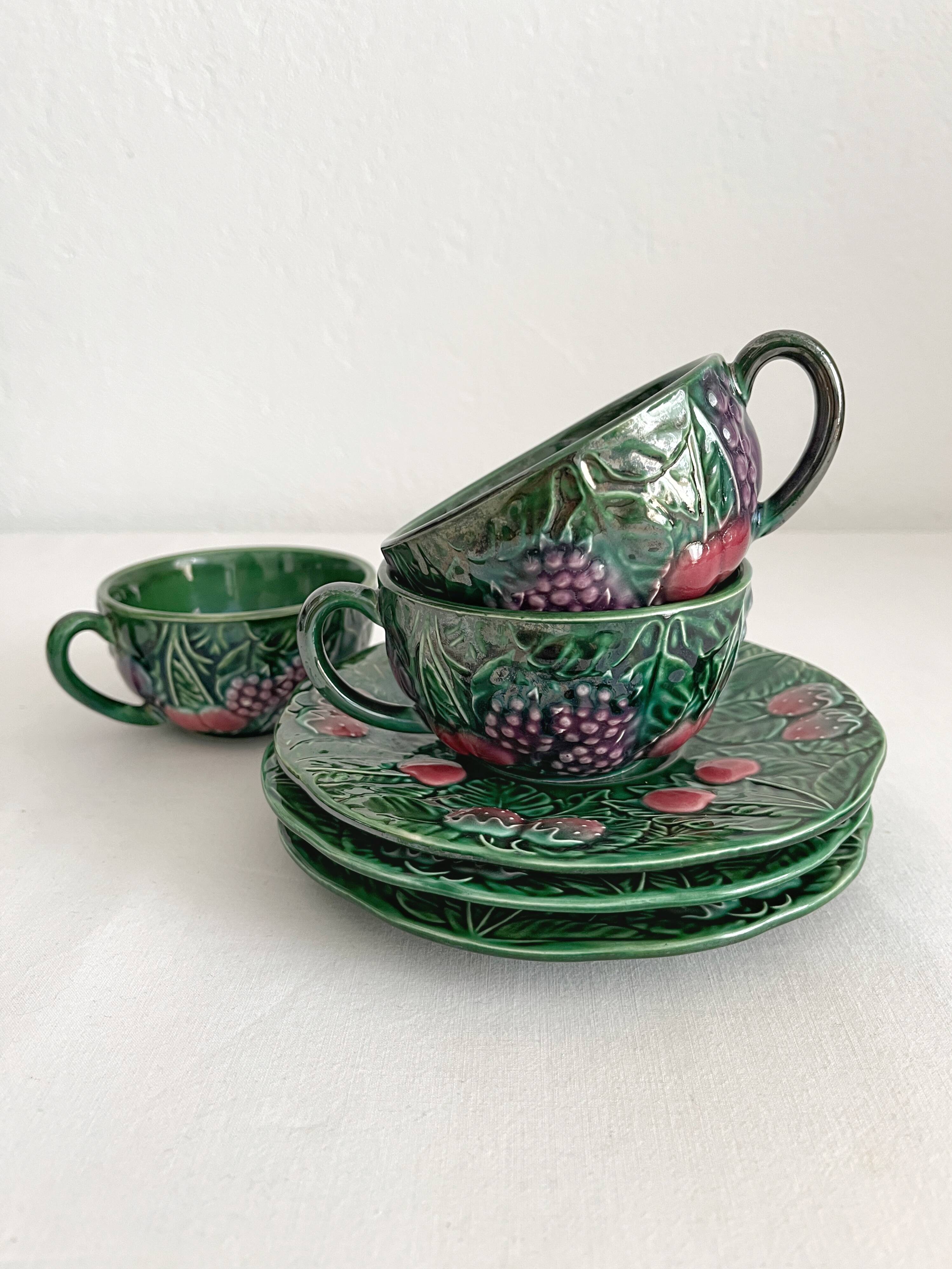 3 earthenware cups and saucers in barbotine fruit decor Salins vintage