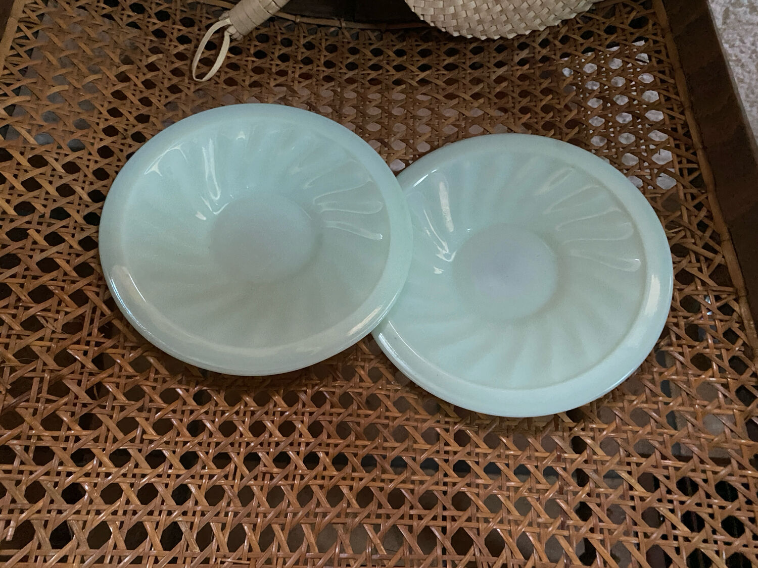 A pair of antique opaline coffee cups.