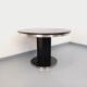 Vintage dining table in melamine with a black wood effect and chrome metal.