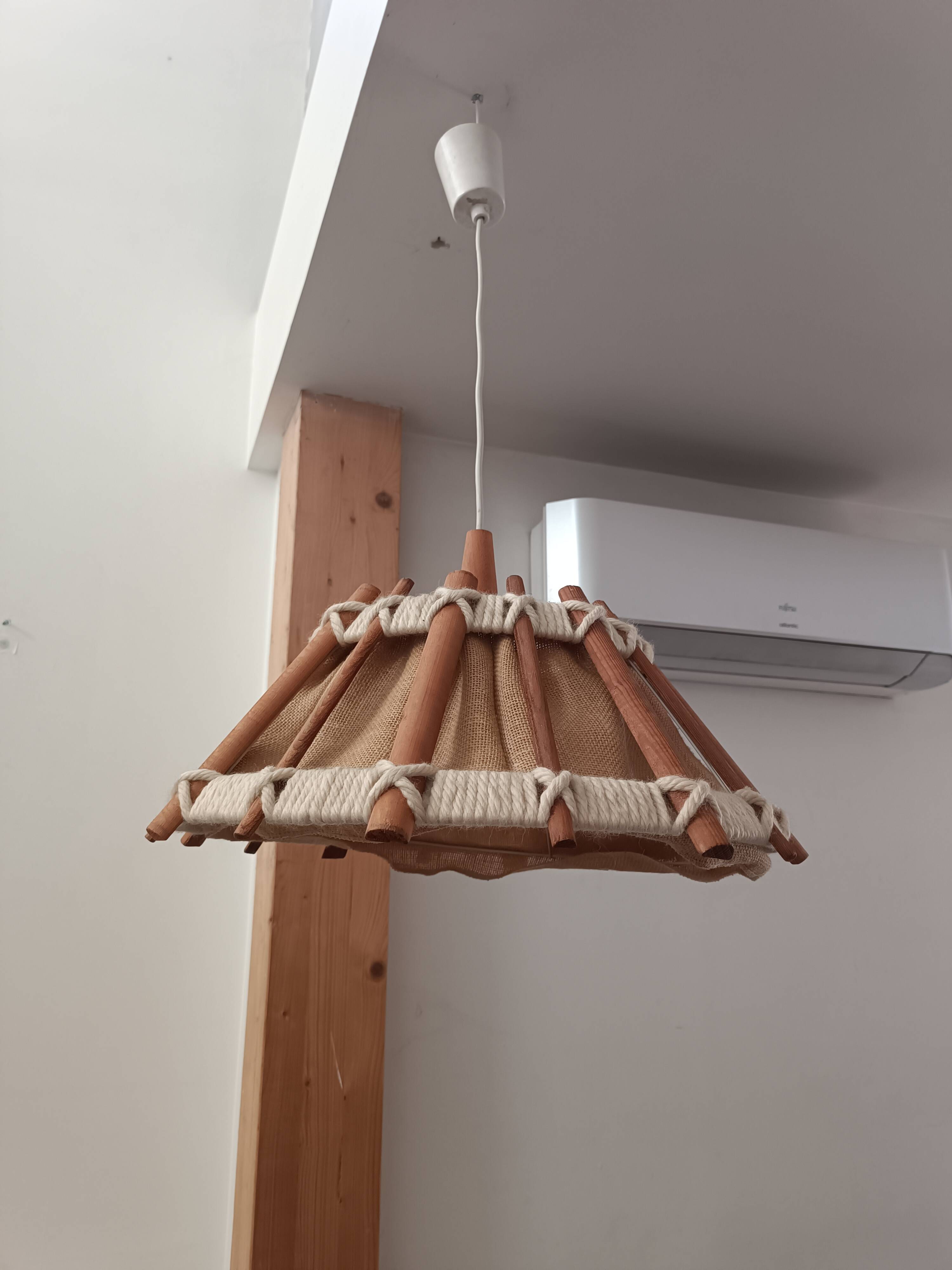 Hanging lamp with wood and cord from the 1990s.