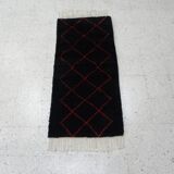 Vintage ancestral black Berber rug in wool