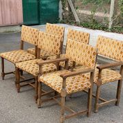 2 Henri II armchairs in solid wood and yellow-beige velvet.