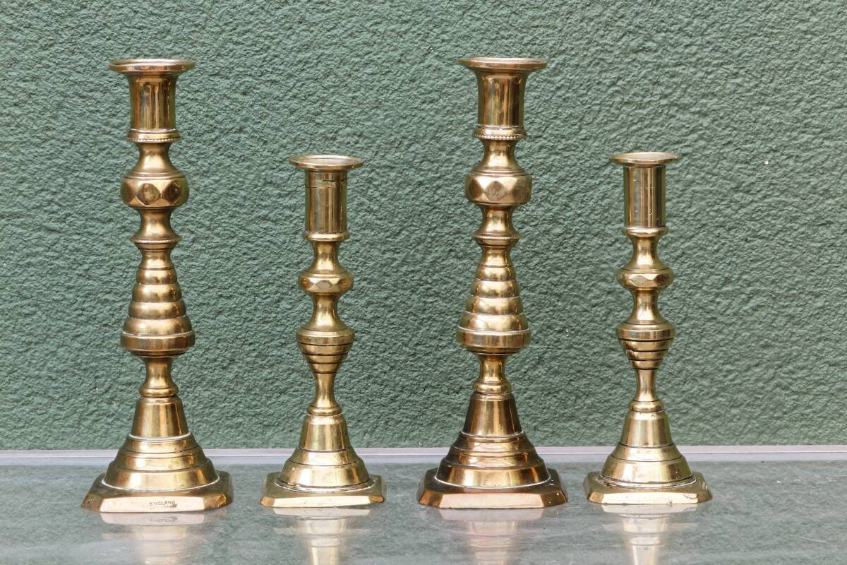 Set of 4 brass candlesticks, England, late 19th century