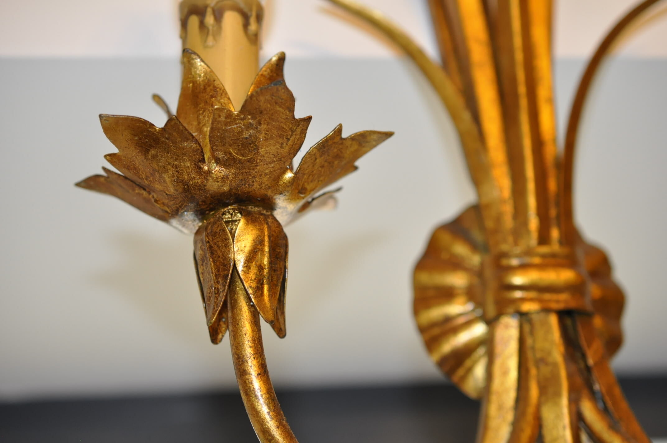 Golden metal wall sconce