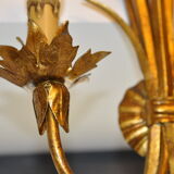Golden metal wall sconce