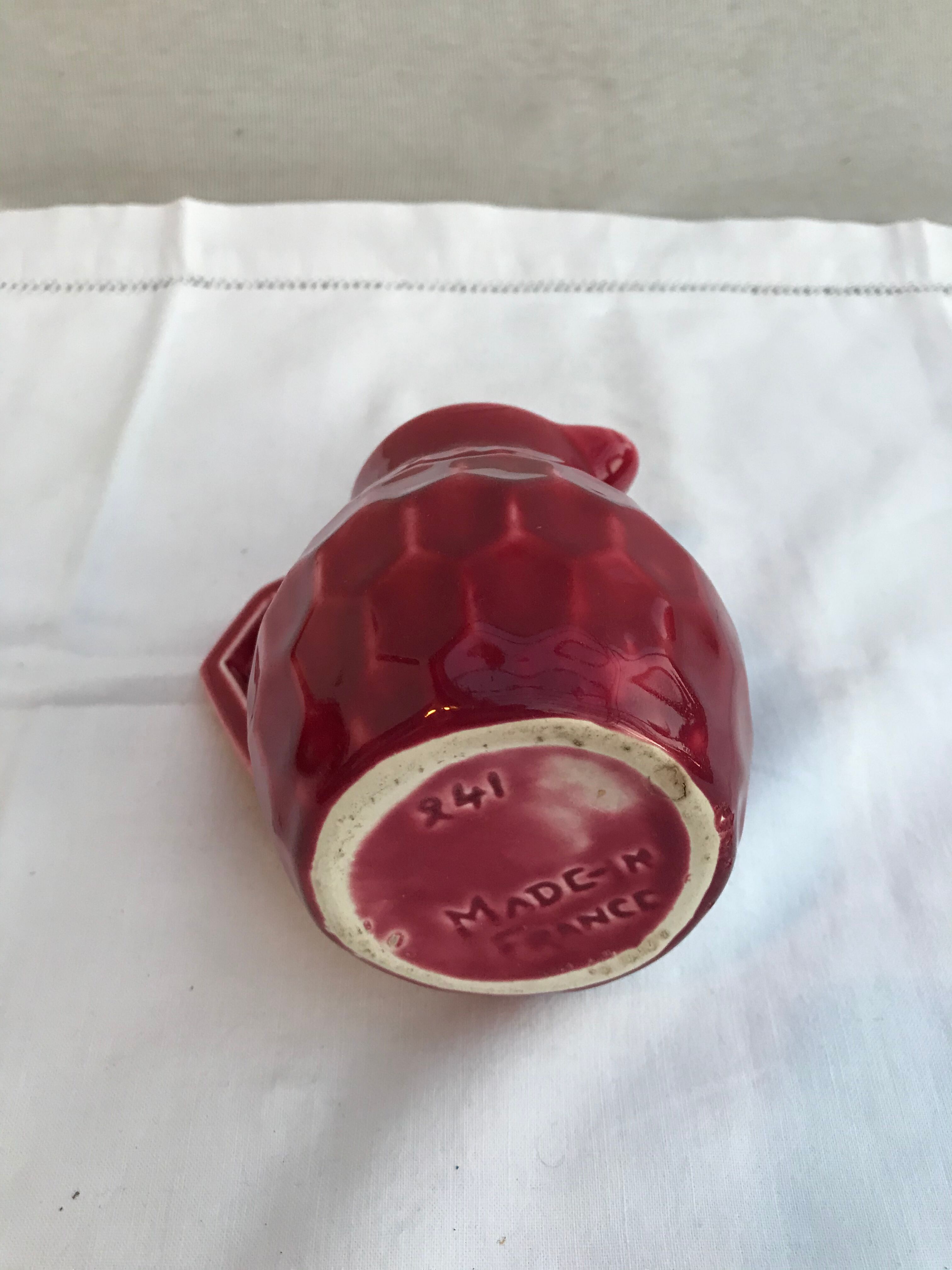 Former art deco red ceramics pitcher