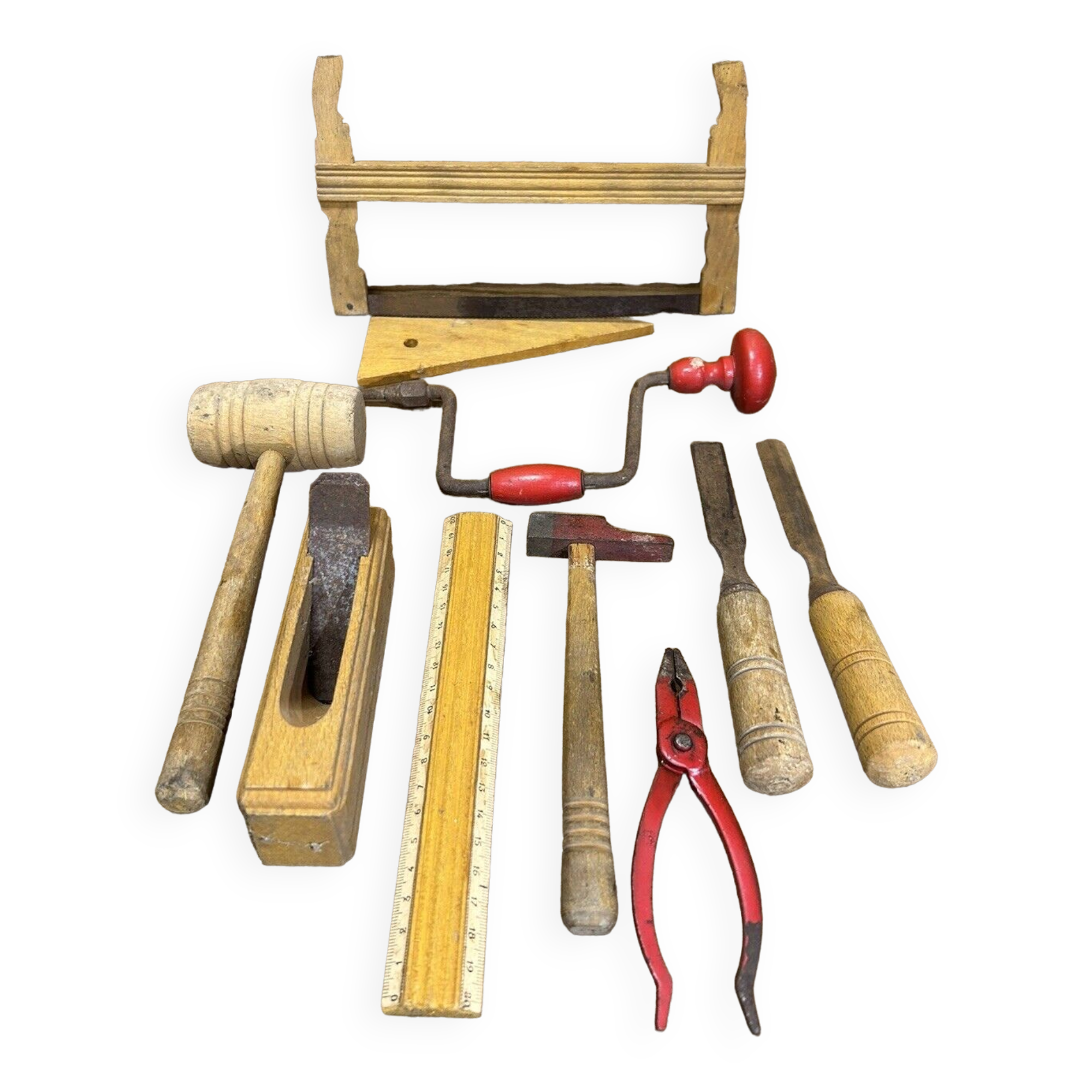 lot of antique toys, carpentry tools, wood, saw, plane, hammer,...