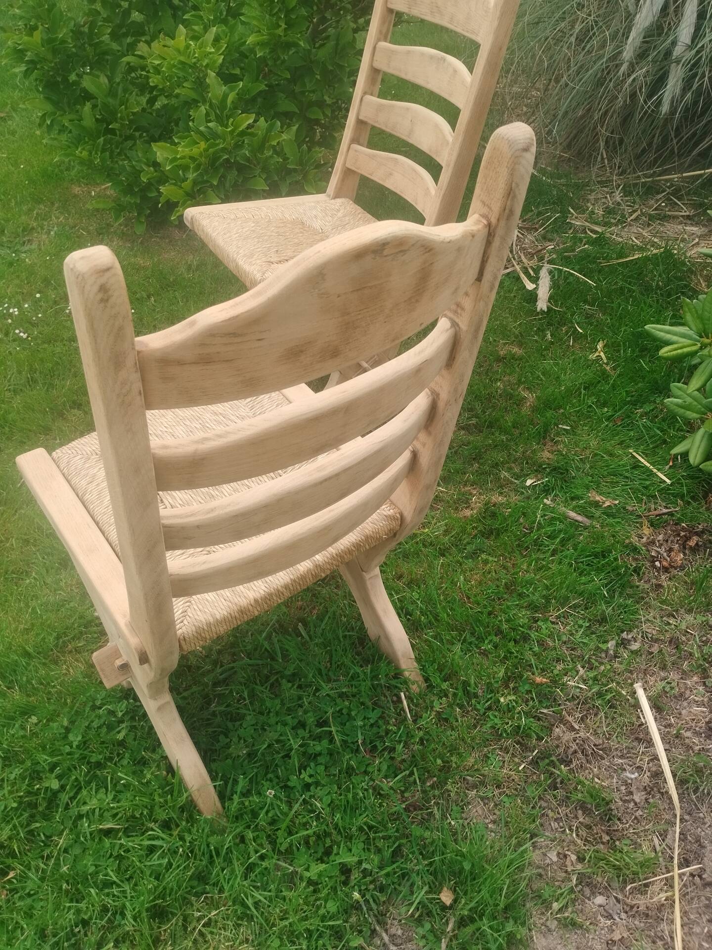 Pairs of vintage Scandinavian chairs with splayed legs.