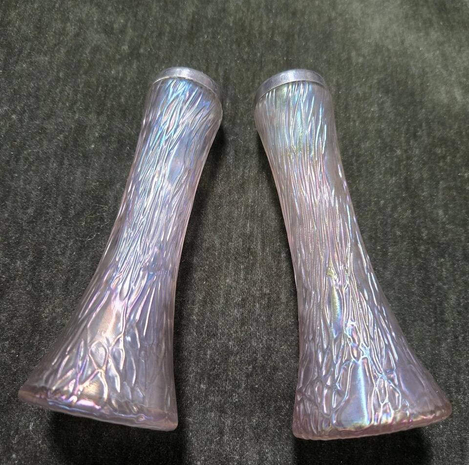 Pair of iridescent glass vases with relief decoration reminiscent of plant motifs.