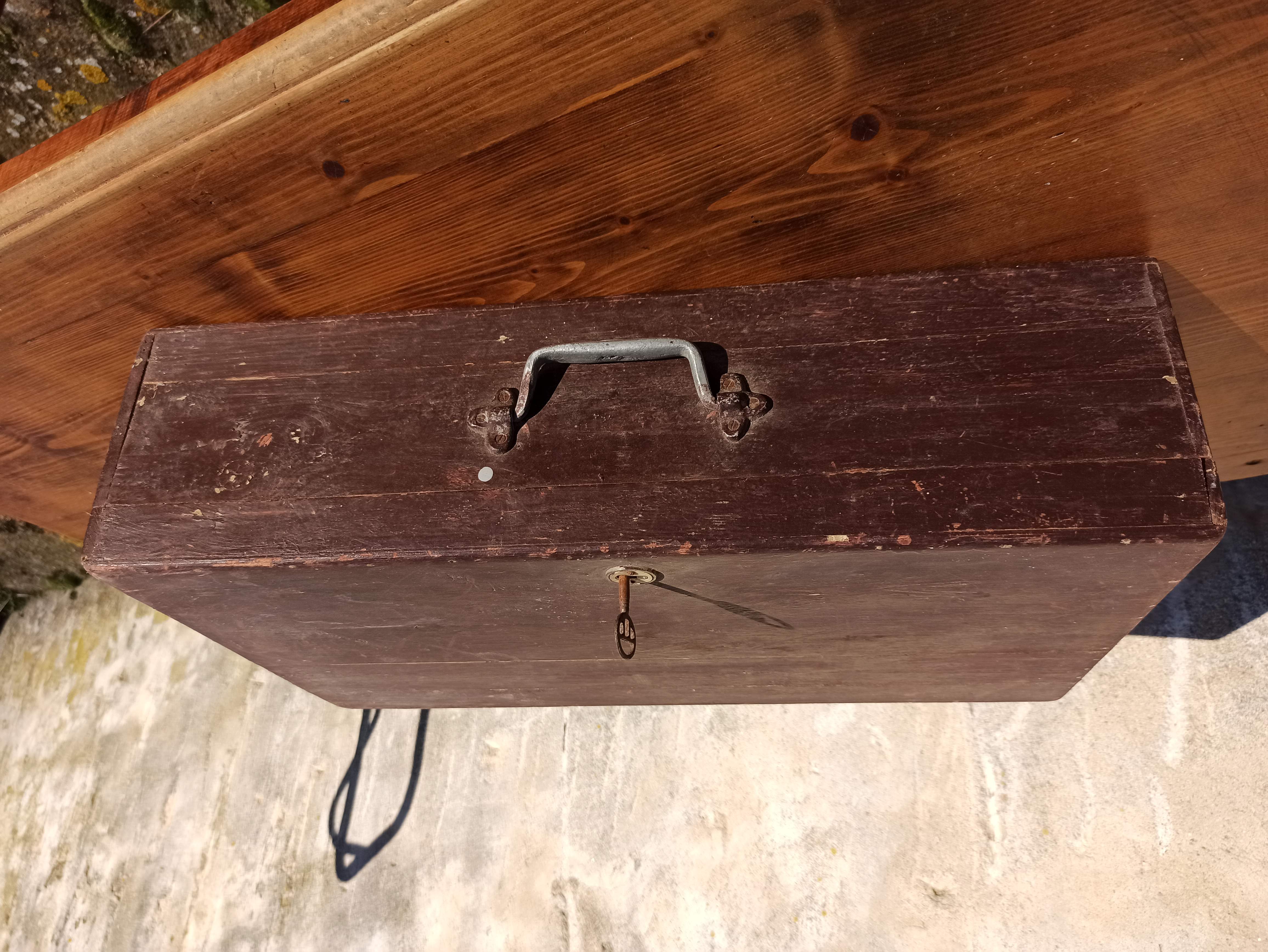 Antique wooden suitcase with lock and key