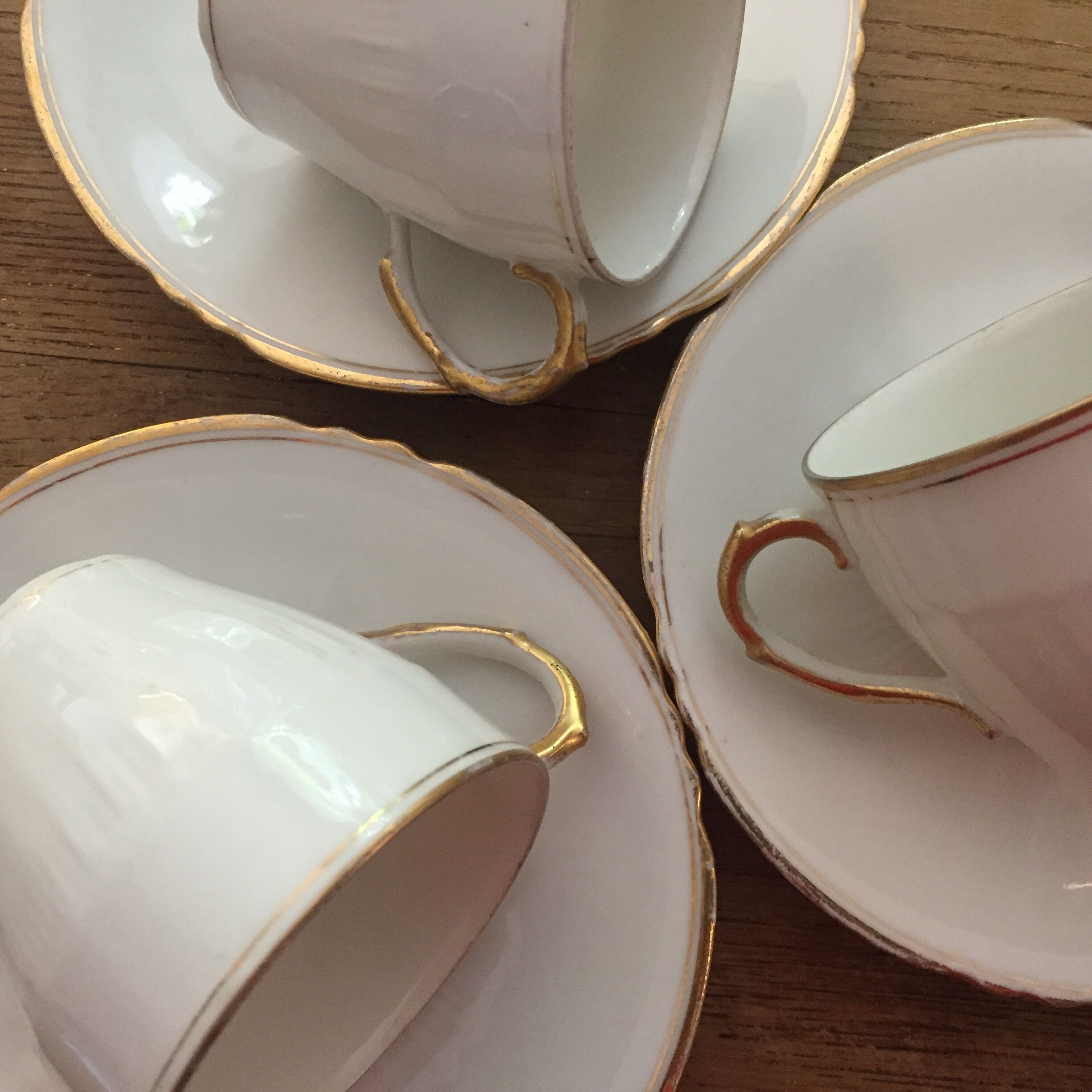 set of 3 cups and old saucers