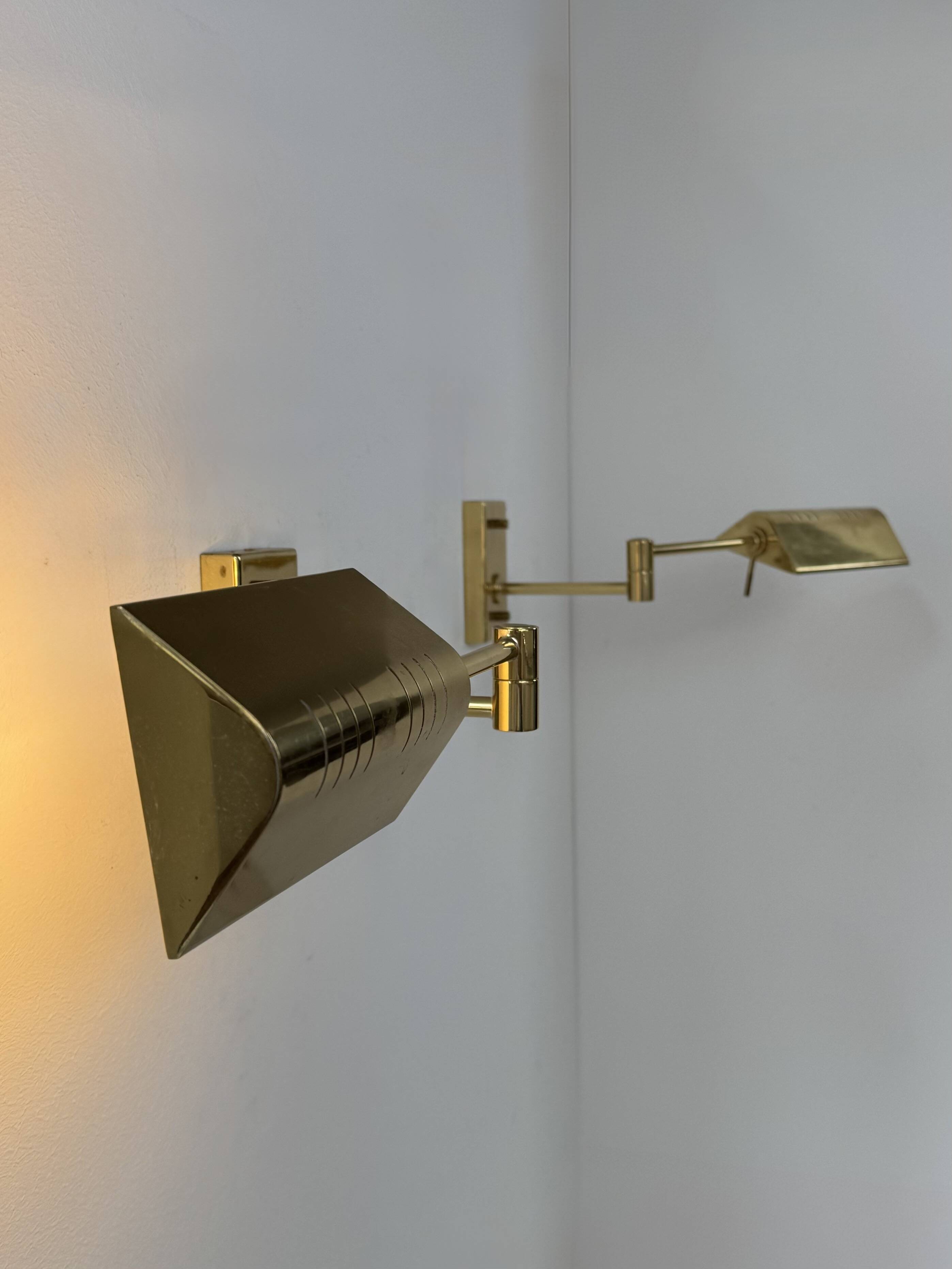 Pair of adjustable vintage wall lights, brass, France, 1970.