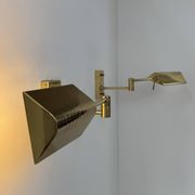 Pair of adjustable vintage wall lights, brass, France, 1970.