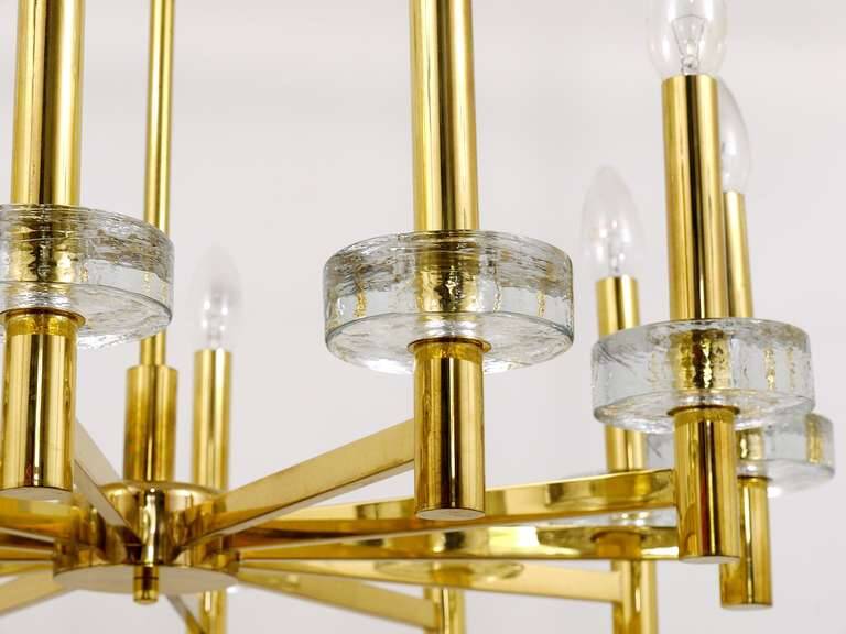 Brass and glass disc pendant light in the style of Gaetano Sciolari, mid-century, Italy, 1970s.