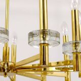 Brass and glass disc pendant light in the style of Gaetano Sciolari, mid-century, Italy, 1970s.