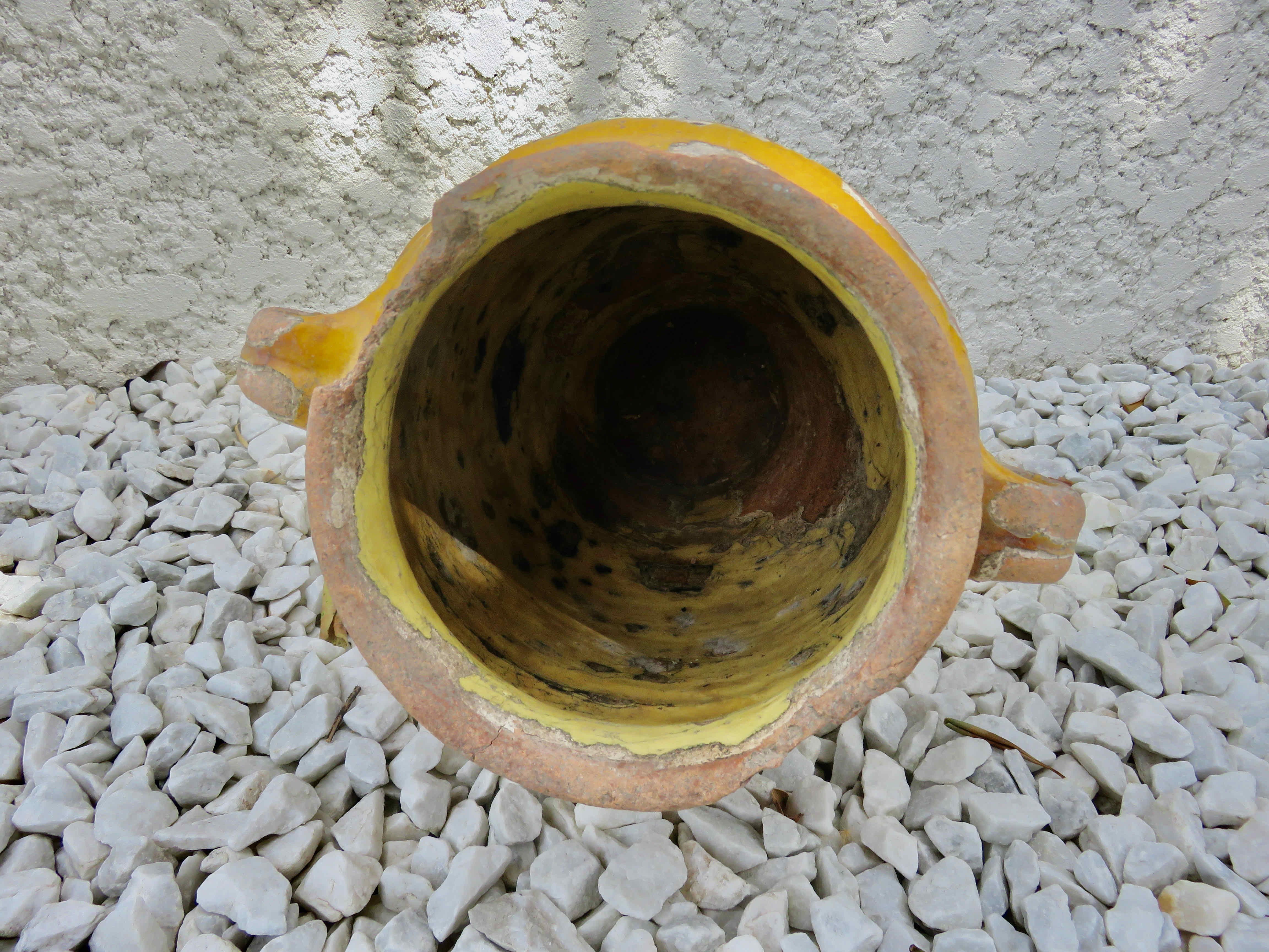 Old candied pot in yellow glazed terracotta XIX century