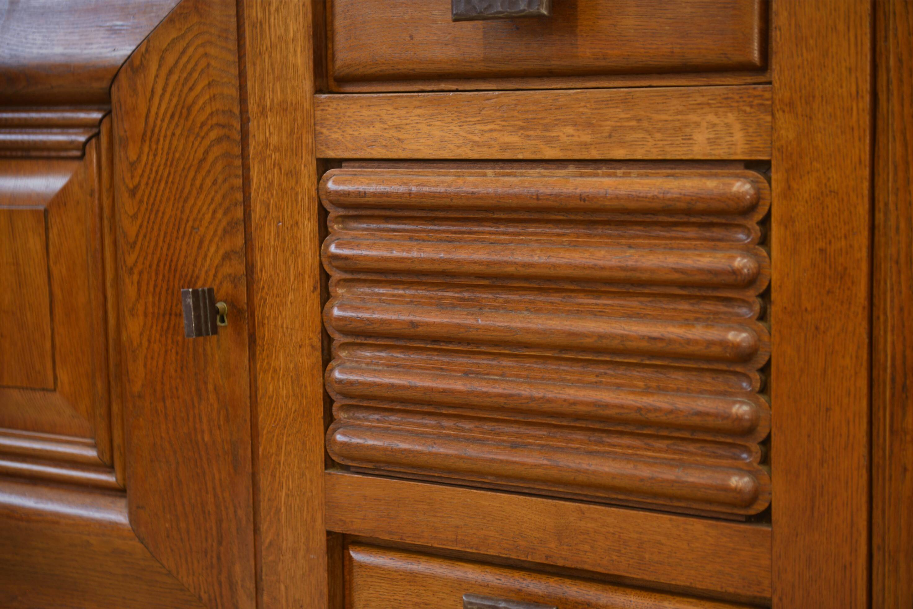 Oak and wrought iron sideboard signed by Charles Dudouyt, 1940s.
