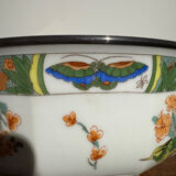 Shallow porcelain plate from Limoges Raynaud, bird decoration.
