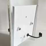 Polished and screen-printed glass sconce by eglo