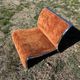 Chrome steel armchair and orange fabric by Vittorio Introini