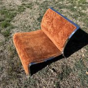 Chrome steel armchair and orange fabric by Vittorio Introini