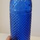 Vintage decanter bottle made of blue molded pressed glass