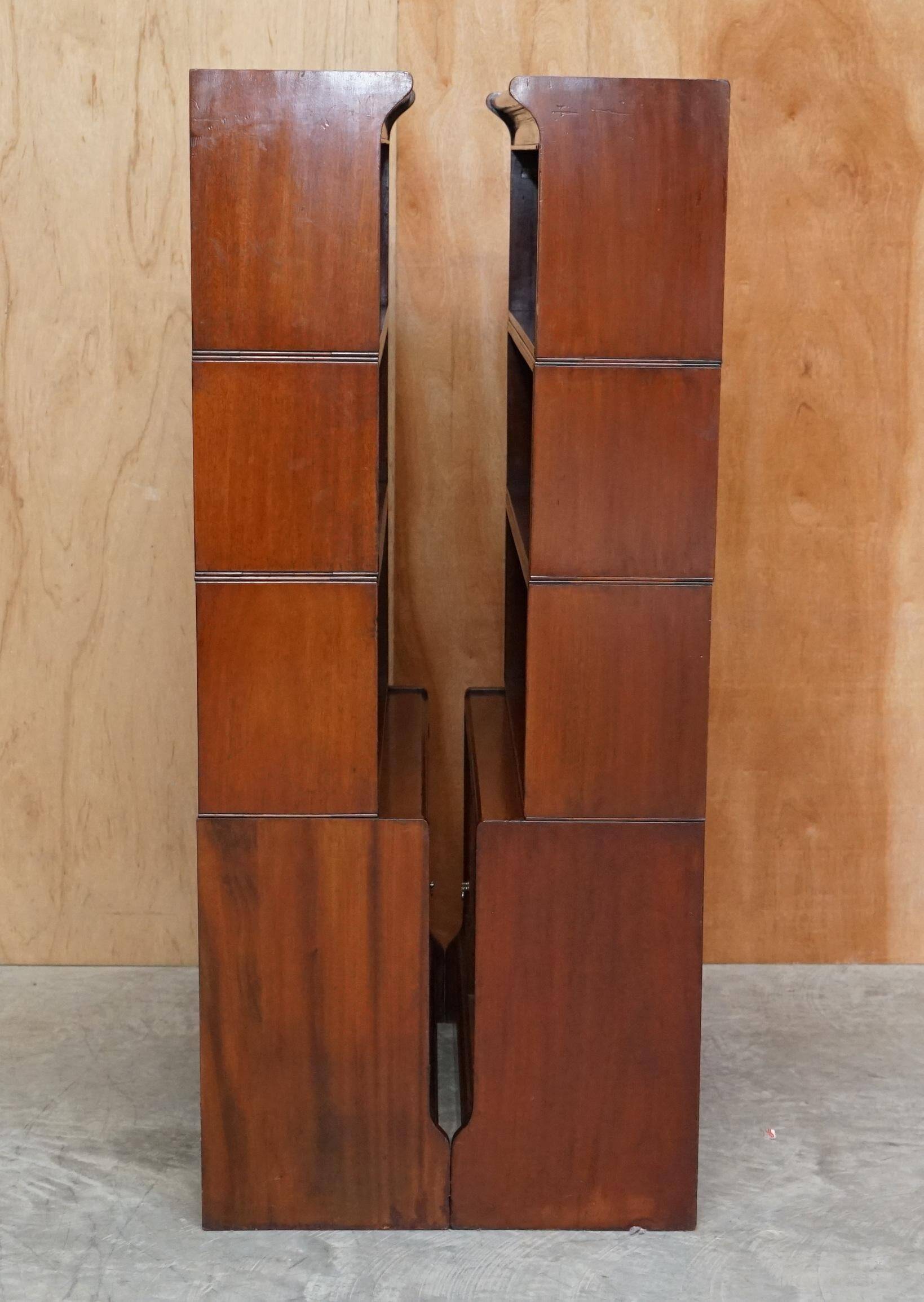 Antique pair of legal bookcases by William Baker Co in hardwood, satin and walnut.