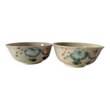 Two large vintage bowls in pastel decor on mini pedestals.