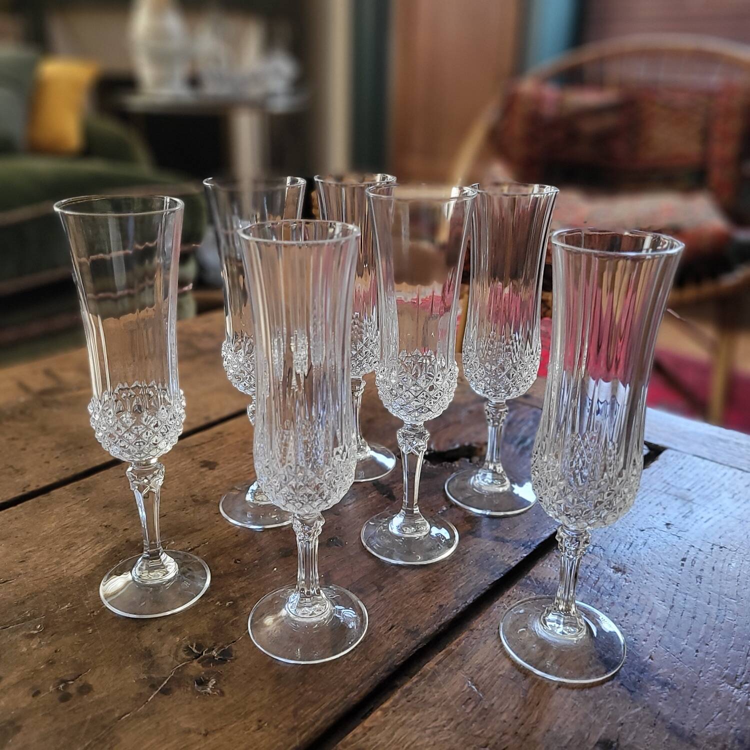 7 cut glass champagne flutes – faceted design
