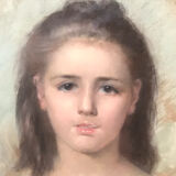 Portrait of a young girl with lilacs