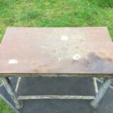 Vintage metal table from an industrial workshop for a makeover