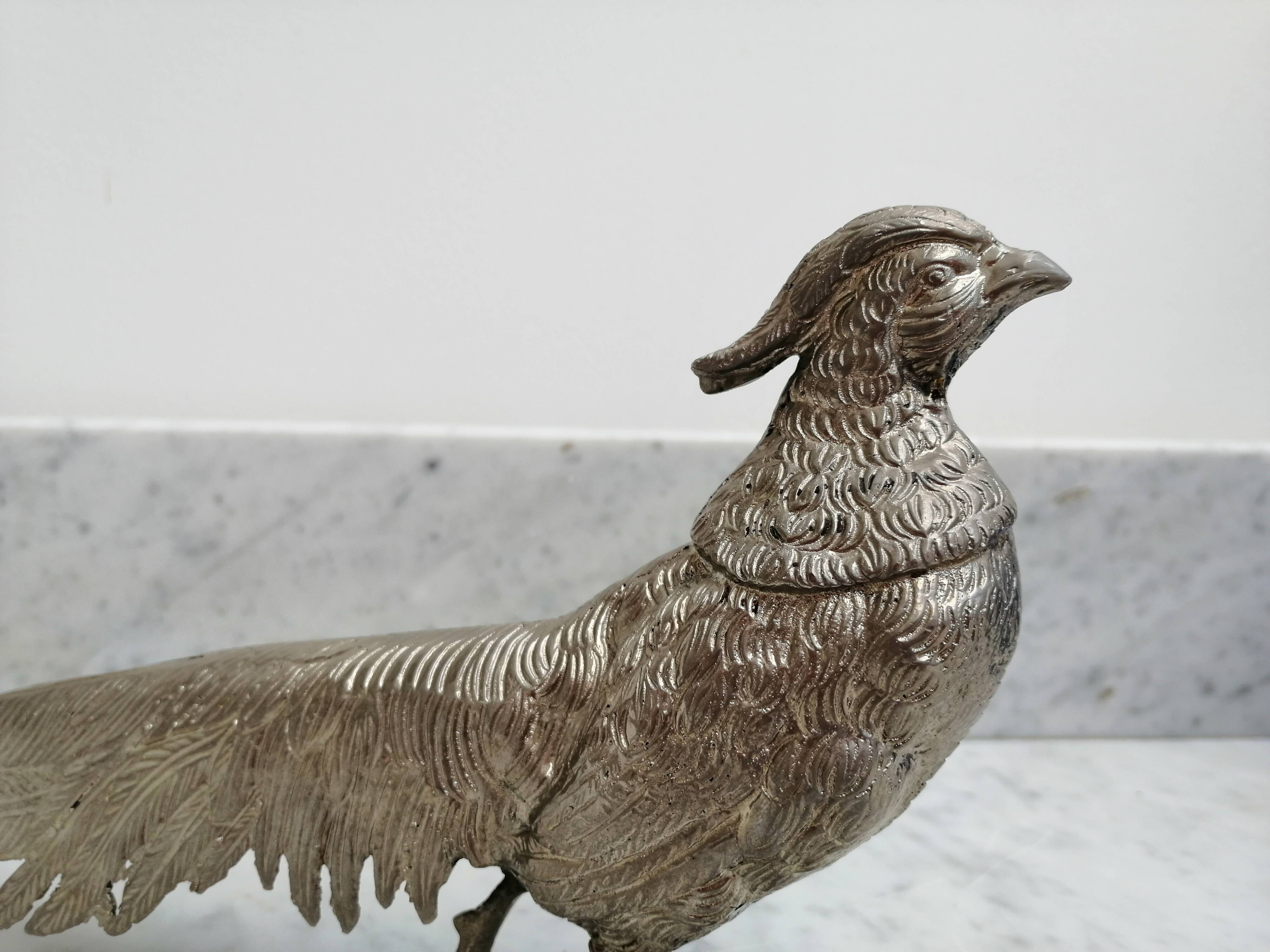 Couple of silver metal pheasants