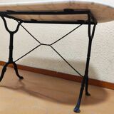 Oval carrara marble table (fixed) and two cast iron chairs