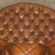 Leather Chesterfield tête-à-tête sofa, 4-seater